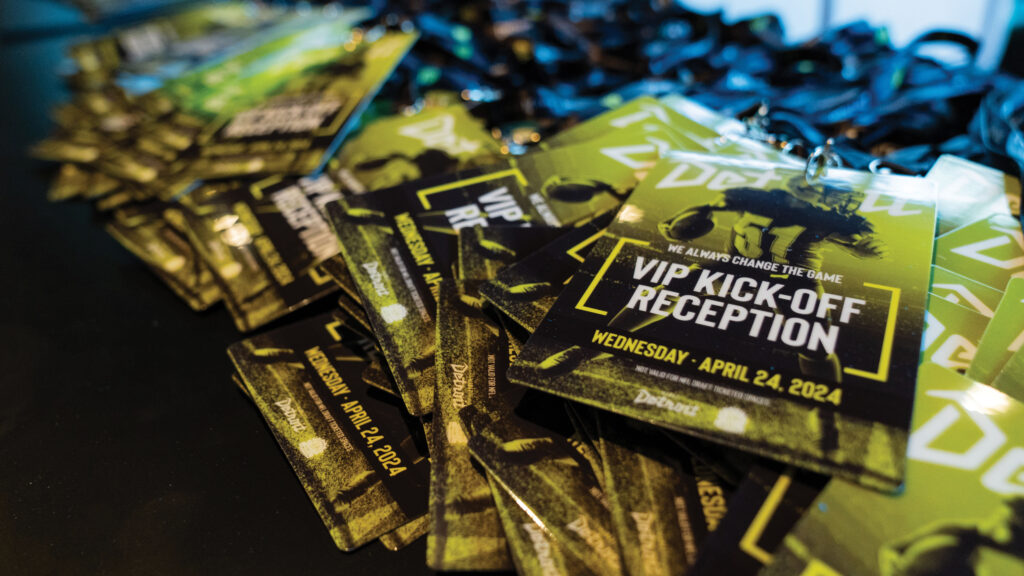 Image of a pile of VIP lanyards for an NFL Draft event