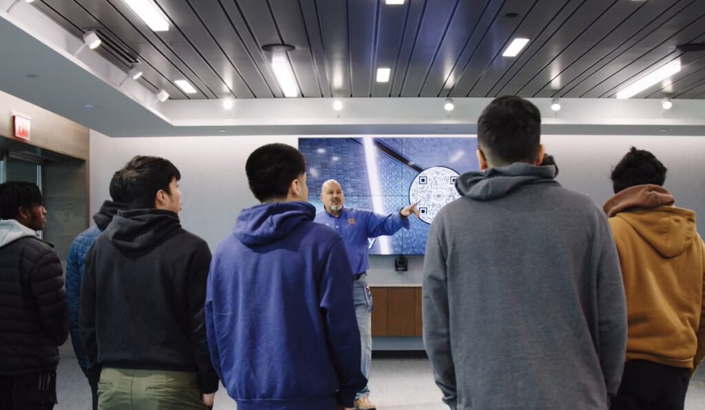 Jamal speaking to students