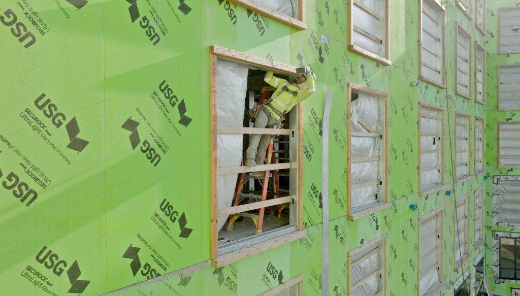 Worker working on a window frame